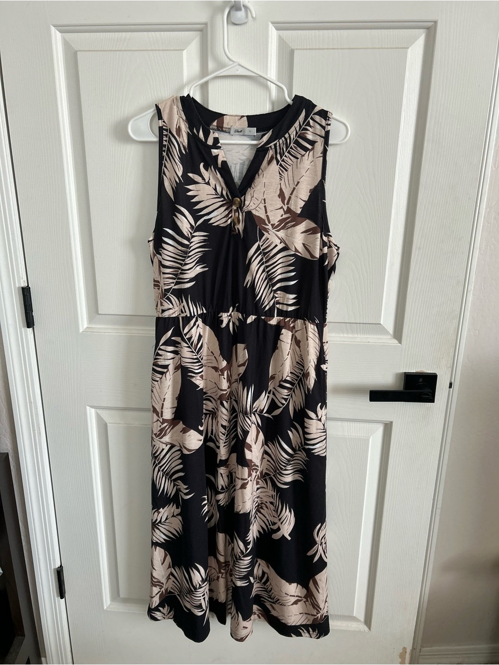 Sleeveless Black Midi Dress with Beige Tropical Print